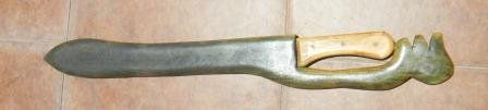 Columbian Machete: Columbian Machete with wood scabbard overall length is 30 inches, the overall length of blade is 20 inches. Condition blade is rusty and pitted. Circa 1950. Shipping $15.00