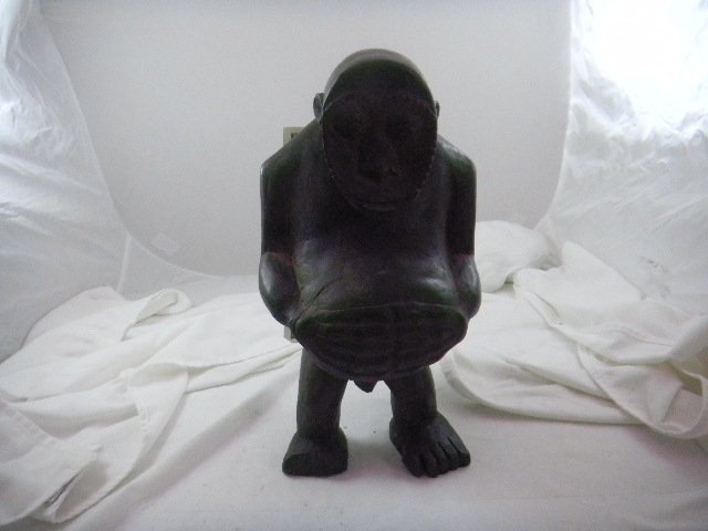 African Wooded Figure Pregnant Ape: African Wooded figure of pregnant ape. Yaka Tribes people, Congo. The item measure 12 by 7 inches. There is documentation from Sdigh Gallery as to Certificate of Authenticity. Shipping $20.00. Conditi