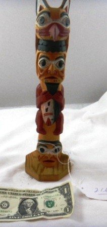 Canadian Wood Totem Pole: Northwest Coast Painted Canadian Totem Pole, measuring 3x12 inches. Condition Very good Shipping $15.00.