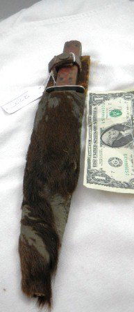 Double Edged Fighting knife: Double Headed fighting knife which measures 12 by 2 inches. This is believed to be made from British Bayonet- some hair loss on scabbard and knife has some staining and rust. Shipping $18.00