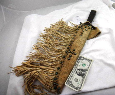 Mountain Man Bowie Knife: Mountain Man Bowie knife with a tack scabbard. The overall measurements are 20 by 4 inches. This is from collection of late Brad Chill of San Diego. Shipping $18.00. Condition has some spooning and ru