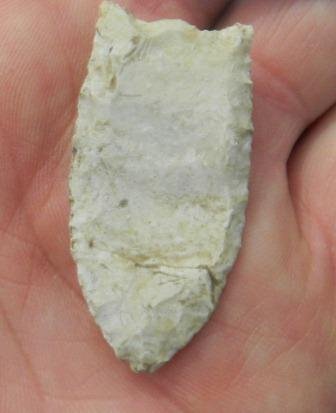 Clovis point: Clovis point, white chert, found in Montana, good patina, approximately 1 13/16 by 7/8 inches Shipping $15.00.
