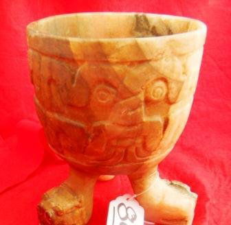 Stone Vessel: Stone Vessel measuring approximately 9 inches by 7 inches. This item is made from Alabaster from the Mexico City Area. Condition is very good. Shipping $25.00. There are three human faces depicted on