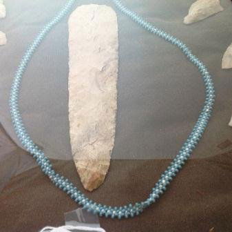 Frame of Flint with Beaded Necklace: Frame of Flint with 13 points ranging from 2 to 8 inches. Items are from Georgia and the ex. Robert Smith Collection. The large blade is museum quality and remaining point are field run. Shipping and