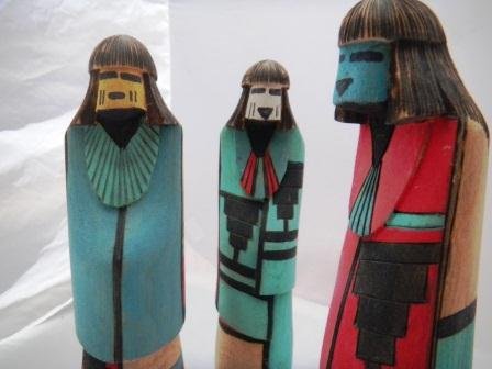 Three Shaliko Kachinas: Three Shaliko Kachina, carved from cottonwood and are all approximately 11 inches tall. They are titled blue corn, yellow corn and snow white. These items were carved in 1993. Shipping and handling $2