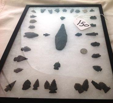 Arrowhead Frame: Arrowhead Frame with Ricker Mount and Buffalo Nickel. This frame contains 36 bird points, tang knife and five inch drill. These item were found near Santé Fe, New Mexico. These are from the ex. Jack 