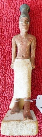 Ancient Egypt Wooden Striding Priest: Ancient Egypt Wooden Striding Priest. Item measures 3" x 13.5". Of the Middle Kingdom, 11th-13th Dynasty, 2100-1700 B.C. Condition: Good w/Paint flaking on side of face. Shipping: $24.