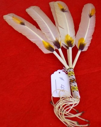 Peyote Dance Fan: Peyote Dance Fan. Beadwork and Feathers. 2 in x 17 in. Condition: Good. Shipping: $18.
