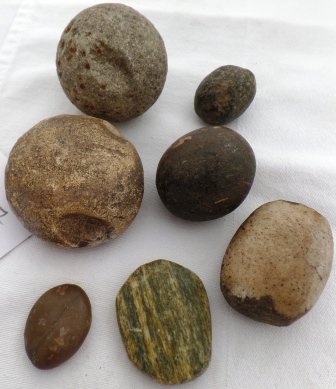 Game Stones: Game Stones. 1 in to 2 inches in size (various). Precolumbian. Chumash tribe. Condition: As found. Shipping: $20.