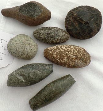 7 Game & Charm Stones: 7 Game & Charm Stones. Chumash Tribe. Precolumbian. 2 in to 4 in each. Condition: As found. Shipping: $20.