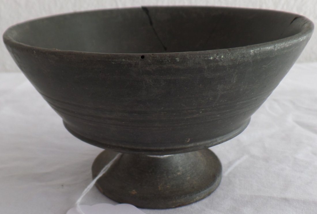 Mediterranean Cup: Mediterranean Cup made on a pottery wheel. Item is possibly Greek and very old. The piece measures 5" x 3" x 2.75". Condition: Cracked and mended. Shipping: $14.
