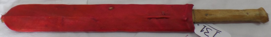 African Double-Edged Sword w/Sheathe: African Double-Edged Sword w/Sheathe. Item measures 20" long. Blade is 14" long and 2.25" wide. Condition: Very Good. Shipping: $18.