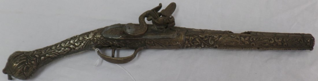 Arabian Flint Lock Pistol w/Steel Sleeve: Arabian Flint Lock Pistol w/Steel Sleeve. Item measures 16.5" long x 3.5" and weighs approx. 3 lbs. Condition: Good, w/patina and inoperable. Shipping: $18.