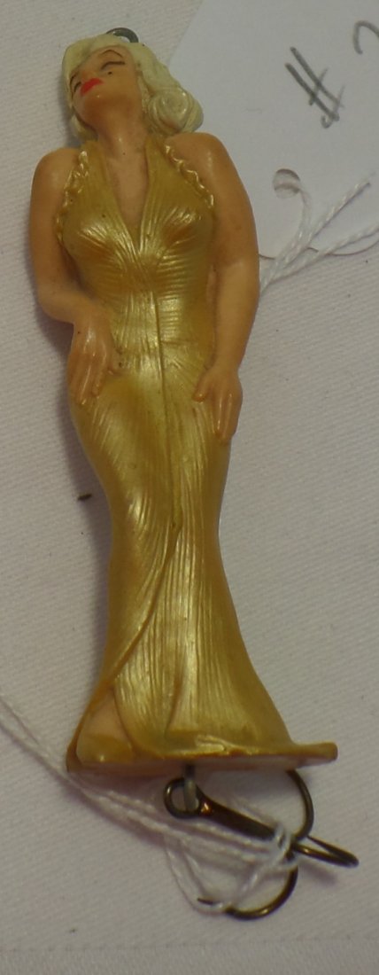 Marilyn Monroe Fishing Lure: Marilyn Monroe Fishing Lure. Item dated approx. 1990. Measures 4" x 1.25". Condition: Good. Shipping: $12.