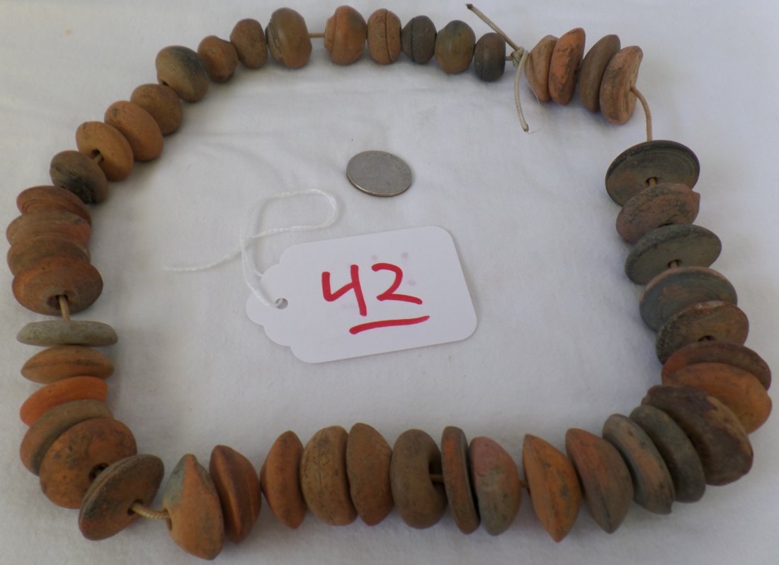 Pre-Columbian Beads: Pre-Columbian Beads, circa 900 A.D. Made of clay on newer string. String measures 20", beads measure in size 1/2" to 1". Pre-columbian, Colima, Mexico. Nice string of 48 clay beads, found in Colima. N