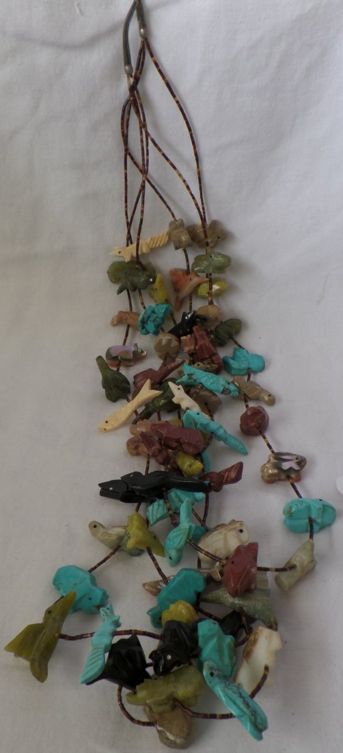 3 Strand Fetish Necklace w/Sterling Silver Clasp: 3 Strand Fetish Necklace w/Sterling Silver Clasp, circa 1950s. Overall length of necklace is 16" long. Zuni. Hand-carved 3 strand fetish necklace features Turquoise, Mother of Pearl, Jet, abalone and