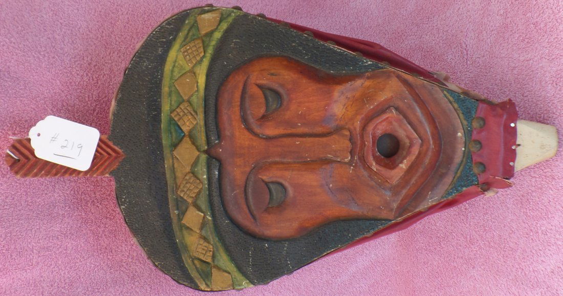 Navajo Bellows: This wood, leather with bellows with tacks and an effigy of a Navajo Face measures 20 1/2 x 11 x 3 inches. The leather is torn on the front and point is missing. This is from a San Diego Estate. This