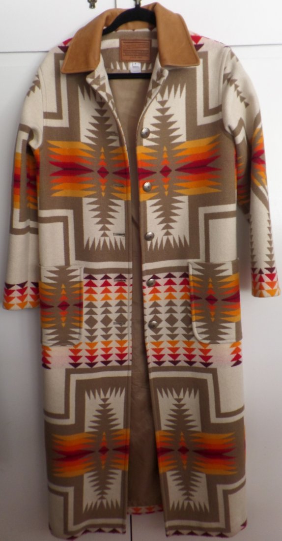 Pendleton Women's Coat: This coat was commission for First Lady Harding. See all the information on the label. This is marked Size small and actually measures 52 inches long 22 inches at the shoulders. It is wool with leathe