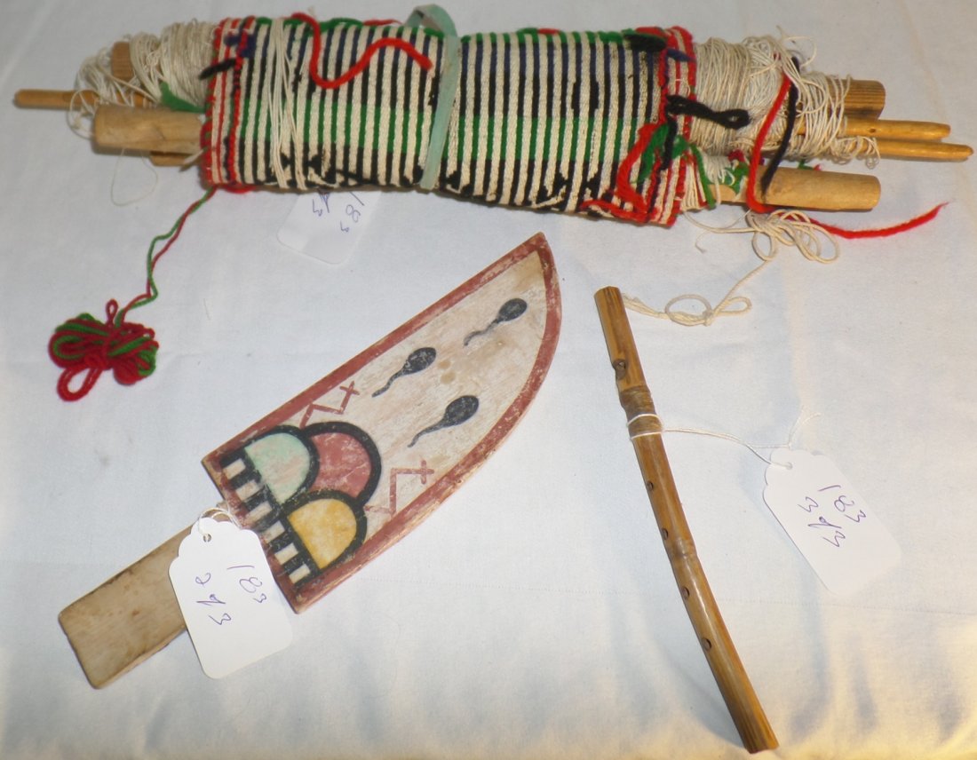 Collection of Hopi Items: Collection of Hopi Items. Circa 1950s. Made of wool, cotton and wood. The sash is EX. Margaret Kilgore. Weaving is 30" x 10", wand is 12" x 3.5". Flute is 9" x 1/2". Hopi tribe. Nice ethnographic Hopi