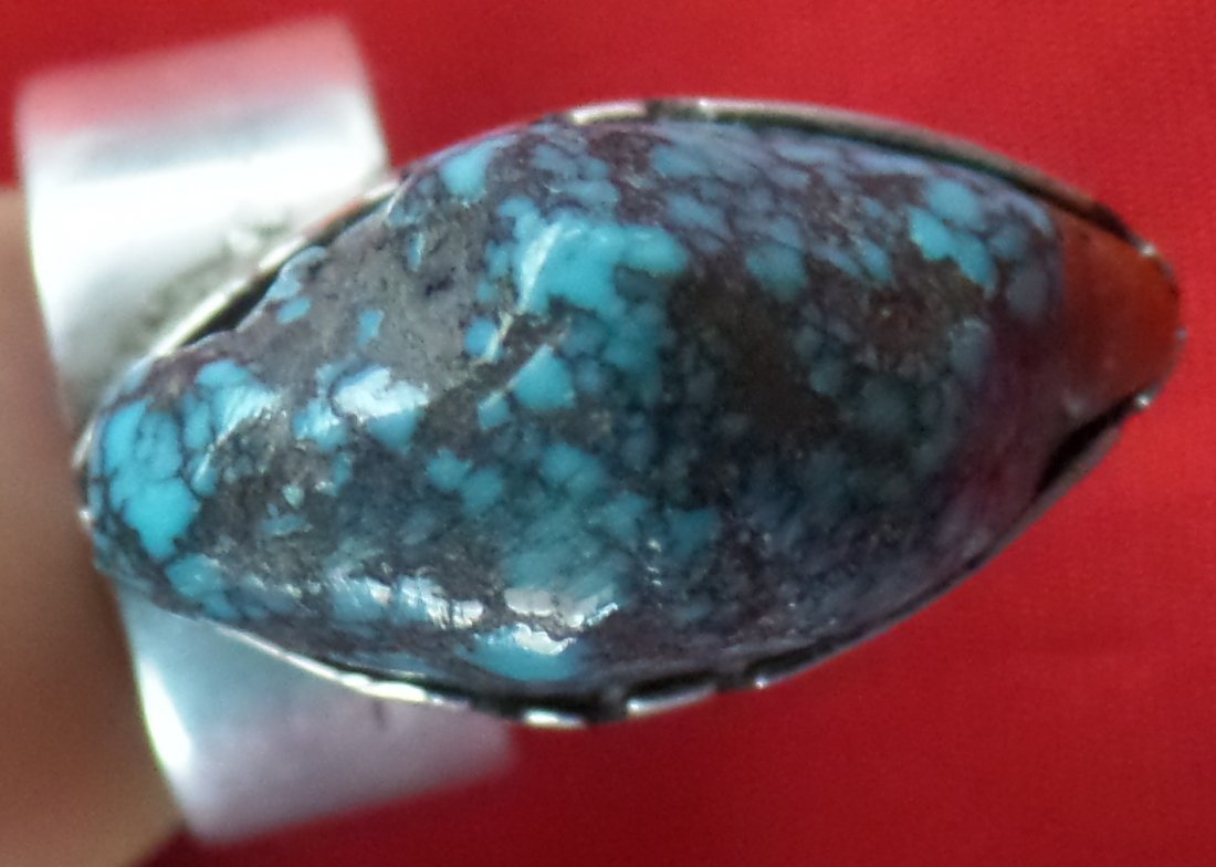 Loloma Ring - Landers Turquoise Stone: Loloma Ring - Landers Turquoise Stone. Artist: Charles Loloma. Circa 1970s. Made of Lander's Turquoise, coral and sterling silver. Ring size 7. Hopi. Investment quality ring, guaranteed to be an Authe