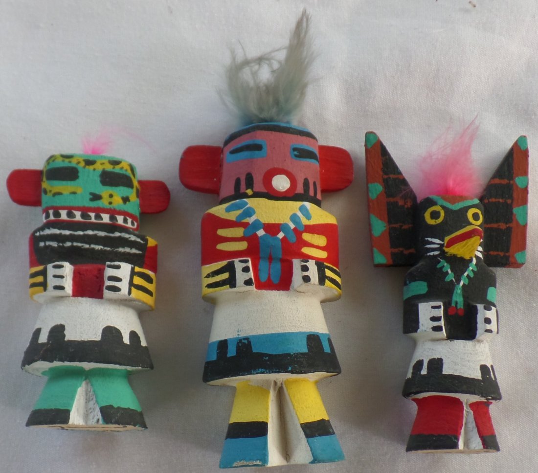 Authentic Hopi Kachinas: 1920s Authentic Hopi Kachinas made of cottonwood, paint and feathers. Lot features 3 kachinas: corn, crow and gourd or guard (?). Gourd kachina has snake painted on head. Corn measures: 5" x 2.25" x 1