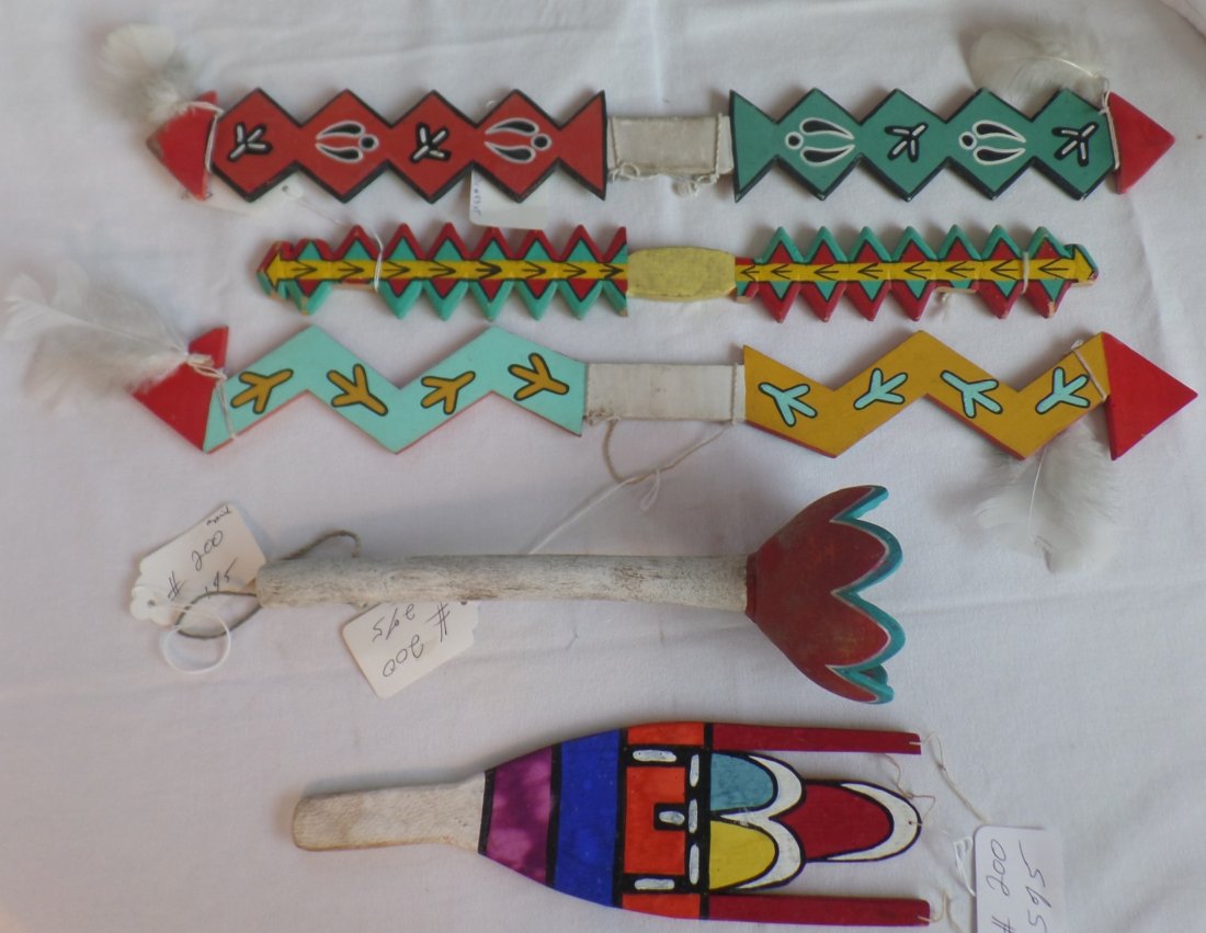 Collection of Hopi Dance Wands: 1960's Hopi Dance wands measuring from 12 to 24 inches. The wands have beautiful bright colors and are made from cottonwood and are painted. Some wear as the wands have been danced. Shipping: $35.00