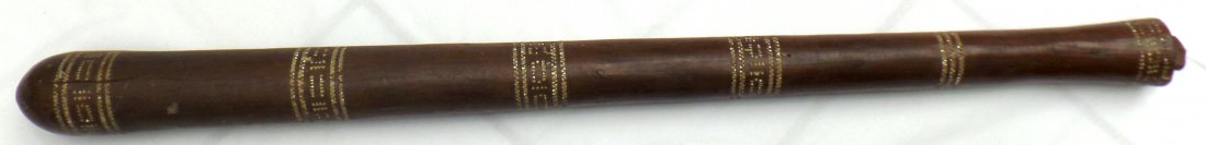 Rare Antique Polynesian Club: This Antique Polynesian Club is from the 1890's and is made of wood with shell inlay. The club is probably Figi and measures 32 1/2 x 2 1/2 inches. There is minor inlay shell loss. It is estimated tha