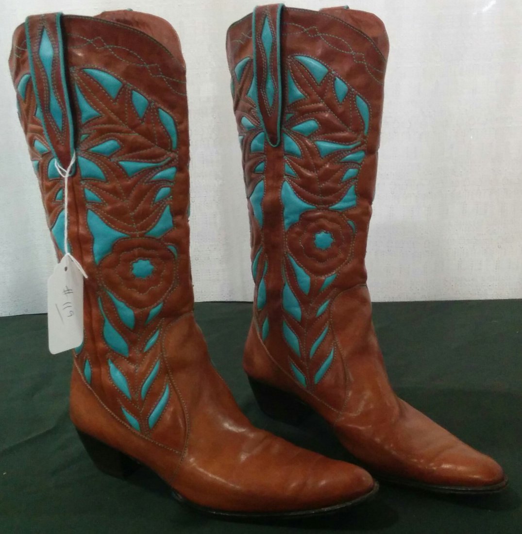 Vero Cuoio Cowboy Boots: Great pair of Vero Cuoio women's cowboy boots. The boots are size 8 1/2 and 14 inches tall. They have beautiful turquoise design. Shipping $18.00