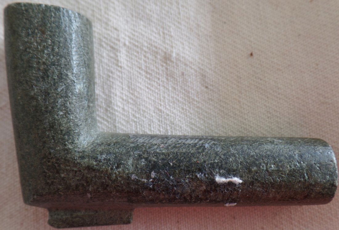 Unfinished Elbow Pipe: From South Dakota is an unfinished elbow pipe (not completely drilled). This item is made from steatite and measures 3x2x1 inches. The frame is not included. Shipping $14.50