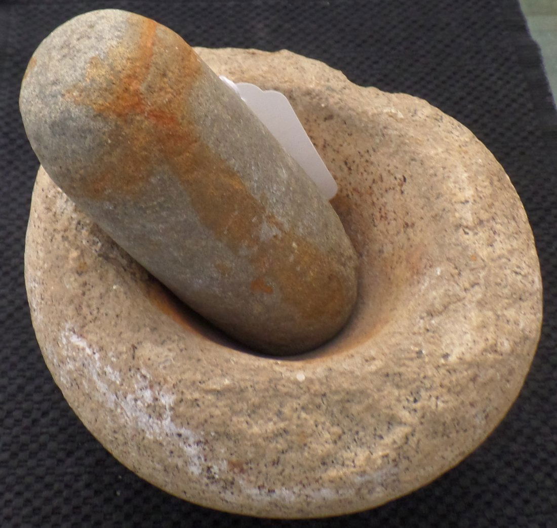 California Mortar and Pestle: Prehistoric California Mortar and Pestle made from granite. The Mortar is 8 x 5 inches, the pestle is 6 x 2 1/2 inches. This items are from Chumash, Santa, Barbara, California. Minor nicks and scratch