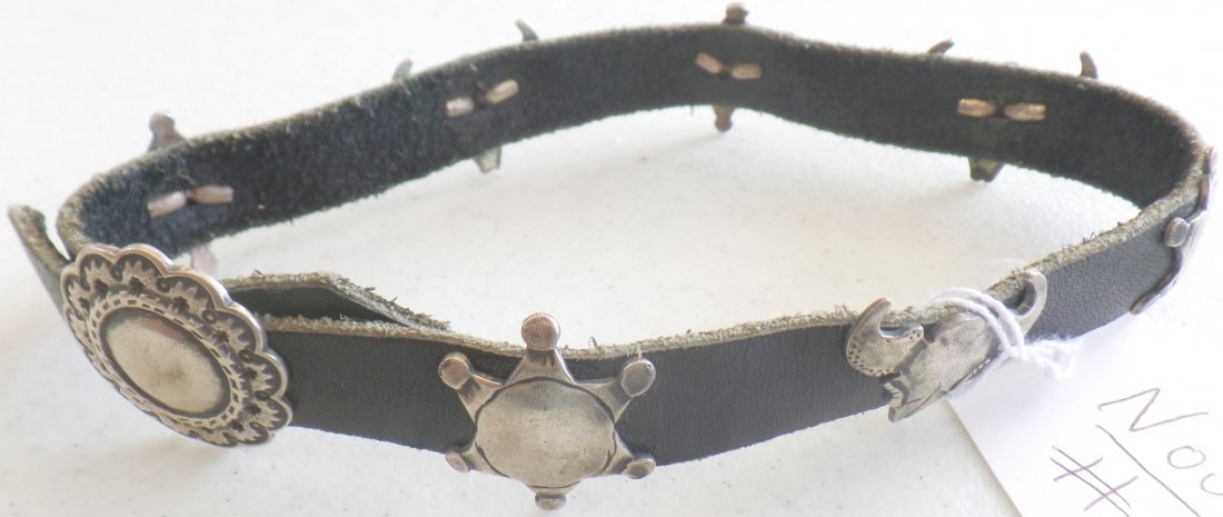 Sterling Silver and Leather Boot Band: Sterling Silver and Leather Boot Band. Item measures approx. 16". Band has alternating sheriff's badge and buffalo heads made in sterling silver. Condition: Worn condition, see images. Shipping: $14.5