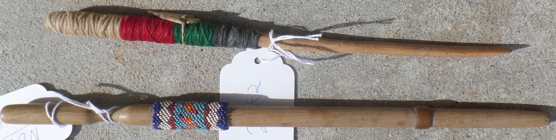 Navajo Ceremonial Sticks w/Cloth & Beadwork: Navajo Ceremonial Sticks w/Cloth & Beadwork. Approx. 50 years old. One measures 10" and the other 12". Condition: Used, one has a metal ring. Shipping $14.00