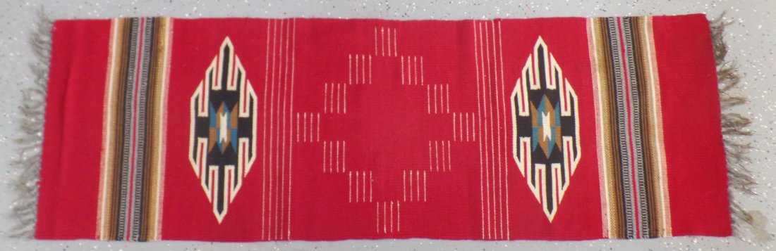Taxco Mexican Weaving: 1940's Taxco Mexican Weaving made from wool and cotton. The item is in great condition with only one or two tiny moth holes. Very clean. With fringe the measurements are 5'5"x1'8" wide. Shipping: $16.