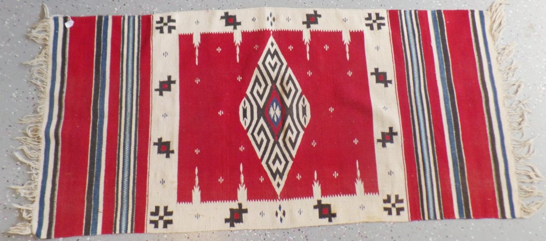 Taxco Mexican Weaving: Taxco Mexican Weaving. C. 1940s. Made of wool and cotton. Measures 5'7" x 2'6". Taxco, Mexican. Very well designed pictorial weaving. Various repeating designs throughout and great color. Features red