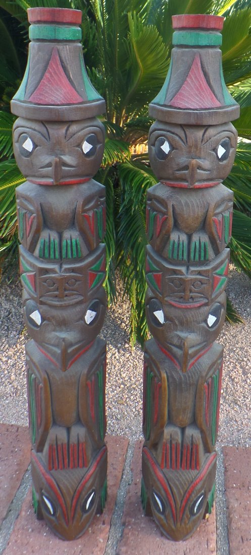Matched Pair Northwest Coast Totem Poles: Matched Pair Northwest Coast Totem Poles. Circa 1950s, possibly made of fiberglass. Items measure 21.5" x 3.5" x 4". Purchased in Canada by consignor. Consignor believed these to be made of cedarwood;