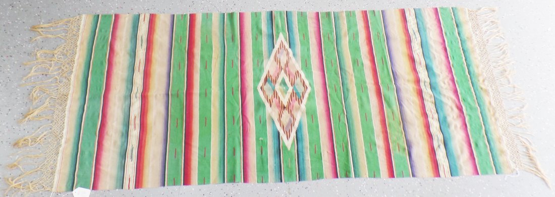 Antique Mexican Saltillo: There is a small hole and some wear and fading on the 1920's wool and cotton Mexican Saltillo. This item is 33 x 80 inches without the fringe. Shipping: $16.00