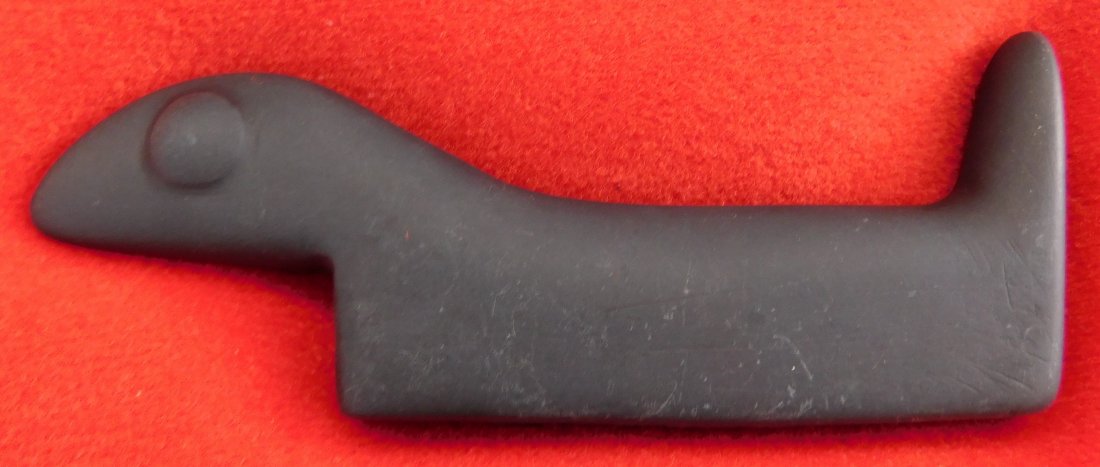 Popeyed Birdstone: Popeyed Birdstone, pre-historic item. Made of slate, item measures 4" x 1.75" x 0.5". From Illinois, previously at the Bergman Museum. Frame is included. Condition: Very good condition, drilled holes 