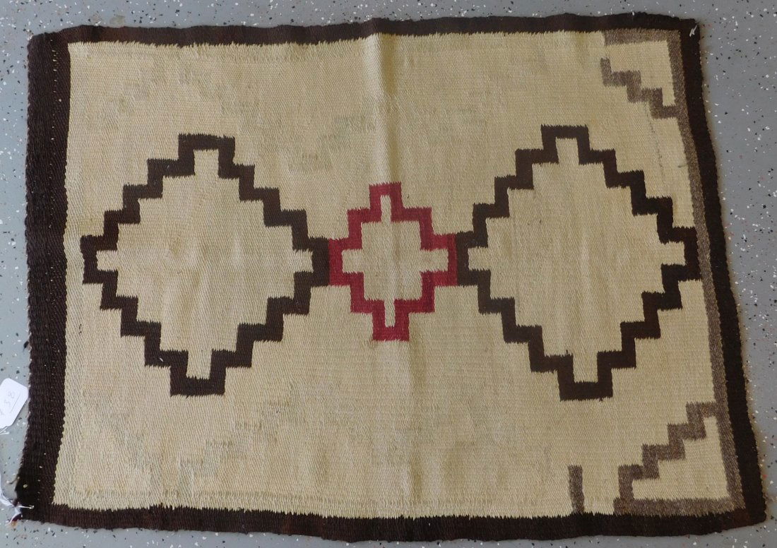 Antique Navajo Weaving: Antique Navajo Weaving from approx. 1950s. Item is made of wool and measures 41 x 30 inches. Condition: Some stains and minor thread loss, see images. Shipping: $30.00.