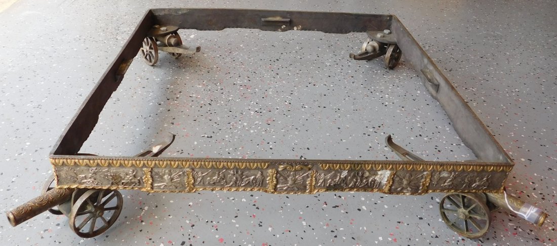 Fancy Base for Military Chest: Fancy Base for Military Chest, possibly 100 years old. Made of iron steel and possibly gold plate, this item measures 21" x 21" x 4.5". Probably French. It has a 9" cannon on each corner. It has milit