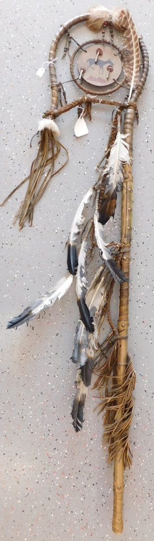 Plains Indian Speaker Staff: Plains Indian Speaker Staff, mid-20th century item. Made of hide, leather, wood, tin cones, turkey feathers, fur, glass beads and brass tacks, this item measures 61.5\" x 12\". Sioux, from South Dakot