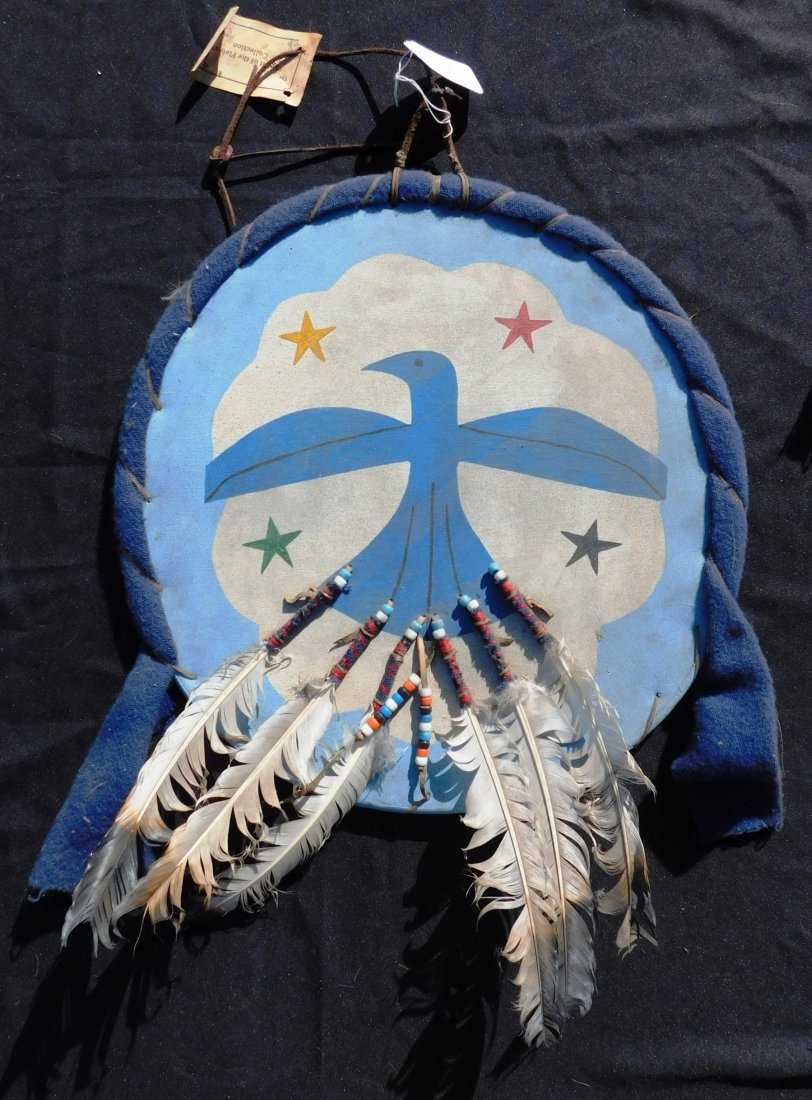 Plains Indian Dance Shield: Plains Indian Dance Shield, circa 1900s. Made of rawhide, paint, feathers, glass beads and cloth. Item measures 18" x 18" x 2". Sioux, from the Dakotas. Beautiful painting of thunderbird on front. Con