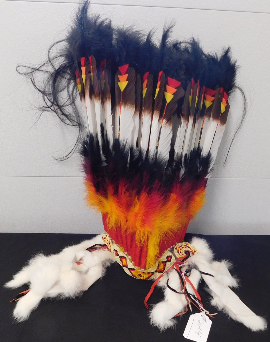 Large Native American Headdress: Large Native American Headdress, 20th century item. Made of glass beads, feathers and cloth, this item measures roughly 32" x 22". Navajo, from New Mexico. Still has the original tag and price from ga
