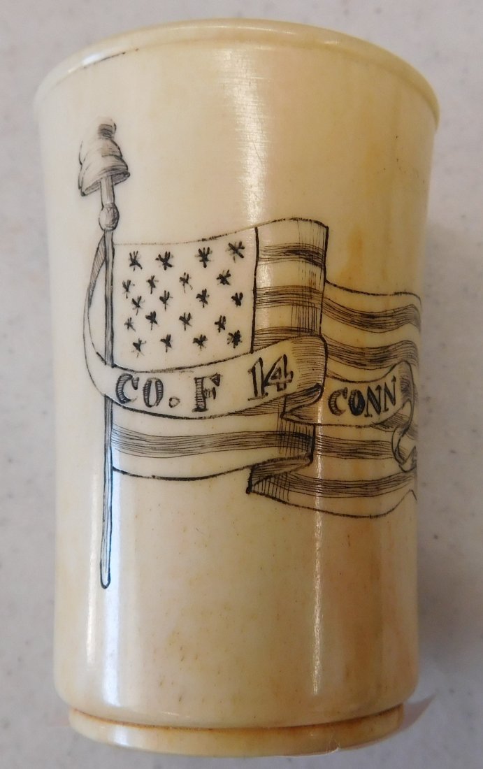 Schrimshaw Whale Bone Cup: Scrhimshaw Whale Bone Cup, circa 1800s. Made of whale bone, this item measures 2.5" x 1.75". East Coast, USA. Flag - Co. F14 Conn. Condition: Nice, see images. Shipping: $16.50.