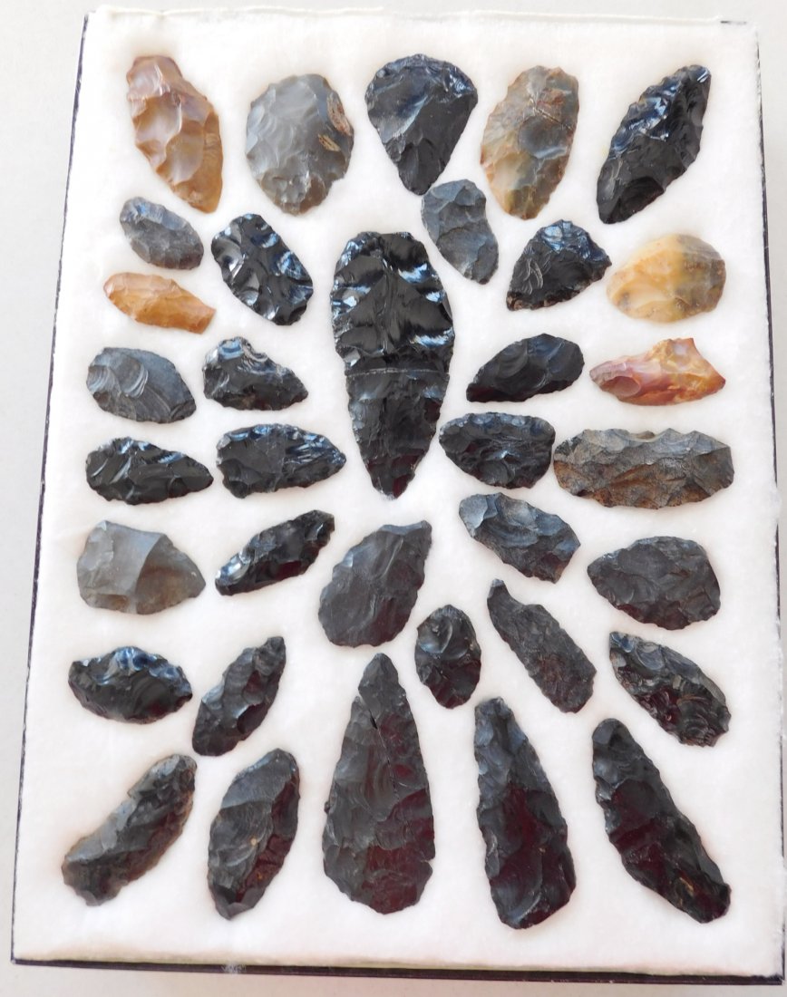 Idaho Paleo Collection: Idaho Paleo Collection, circa 8000-12000 years old. Made of obsidian and chert, the largest item measures 4.5". Found near Boise, Idaho. There are 34 blades, frame not included. Condition: Some were f