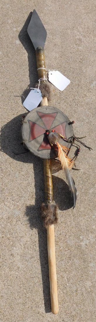Plains Dance Spear: Plains Dance Spear, circa mid-20th century item. Dance spear measures 35 x 6 x 3 inches. This item has wood, steel, brass, paint, feathers, fur and beads. Sioux, South Dakota. Condition: Some wear but