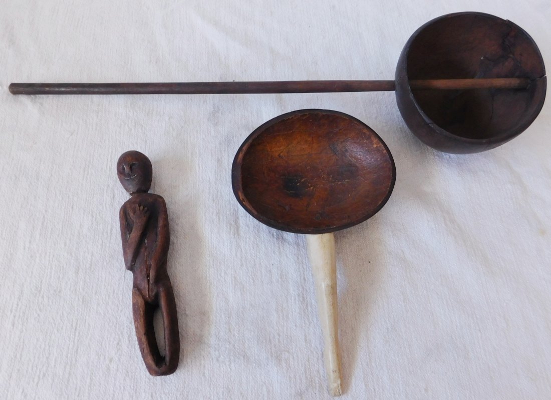 Polynesian & Eskimo Carvings: Polynesian & Eskimo Carvings, circa 1900. Made of wood, coconut shell and bone, the longest is 16". From Hawaii and Alaska. A knowledgeable collector has contacted us regarding the Human figure, belie