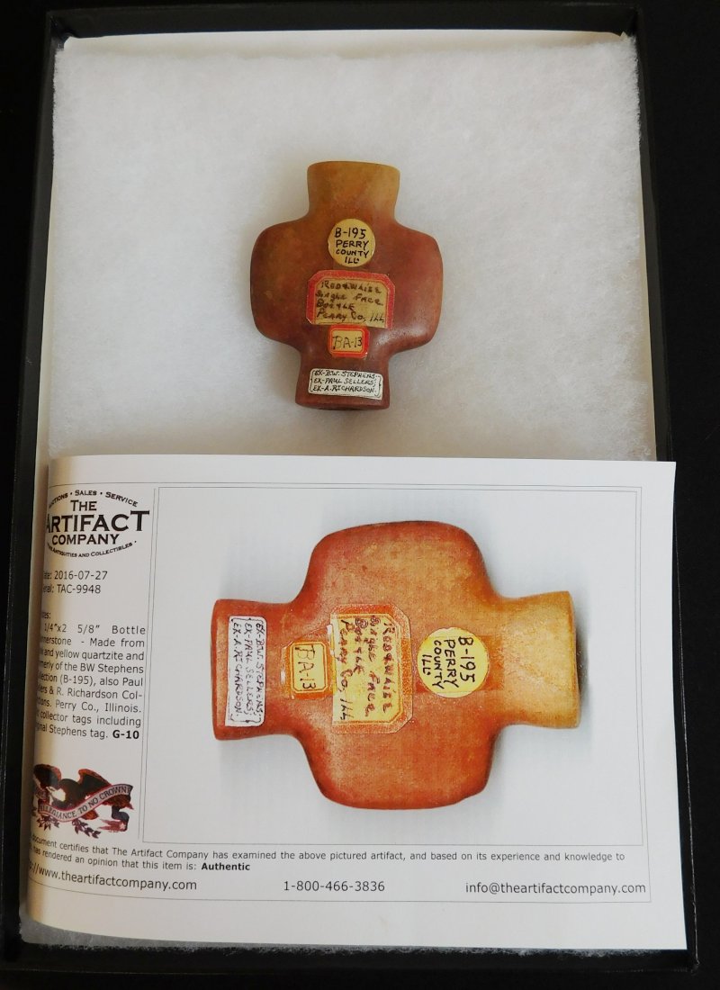 Orange Quartz Bottle Bannerstone: Orange Quartz Bottle Bannerstone, pre-histori citem. Made of Ferris Bearing Quartz, this item measures 3.25" x 2 5/8". From Perry County, Illinois. Ships with Certificate of Authenticity by The Artifa