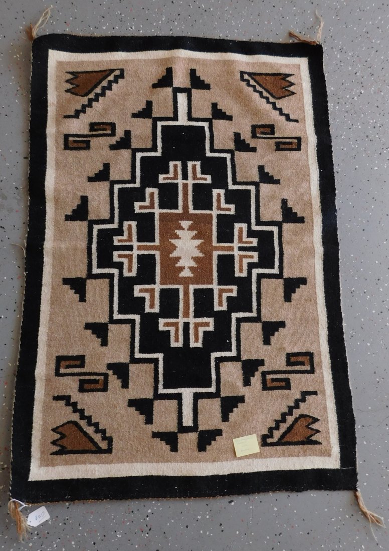 Two Grey Hill Navajo Weaving: Two Grey Hill Navajo Weaving, circa 1960s. Made of wool and dye, this item measures 42" x 28". From New Mexico. All natural rug. Condition: Very fine, see images. Shipping: $30.00.
