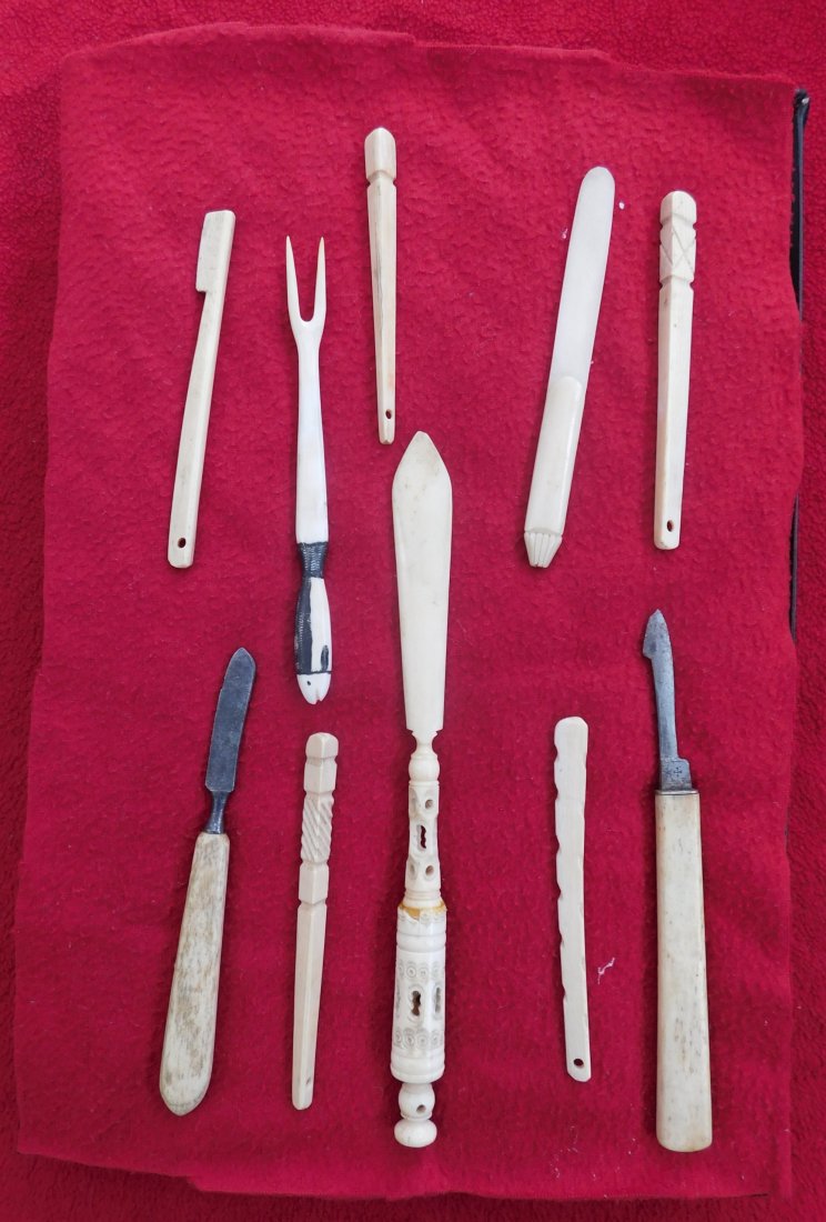 10 Eskimo Tools & Carvings: 10 Eskimo Tools & Carvings, circa 1890s. Made of bone, the smallest measures 2.75" and the largest is 6". Eskimo. Frame not included. Smallest is a microscope slide. Condition: Good, see images. Shipp