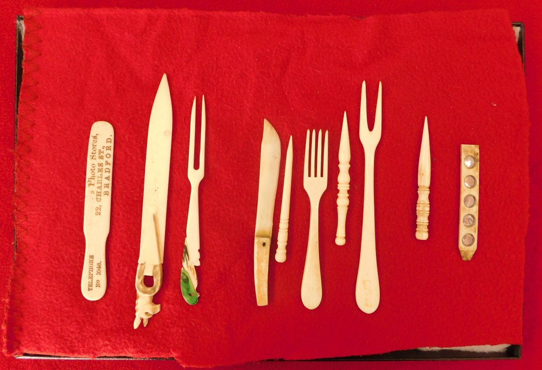 Ten Eskimo Bone Tools and Carvings: Ten Eskimo Bone Tools and Carvings, circa 1890s. Made of steel and bone, these items measure 4 to 7 inches. Items could be either Alaskan or Russian. Knives could be surgical instruments! Frame not in